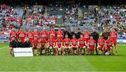 16 July 2023; The Derry squad, behind a #UnitedForEquality sign, before the GAA Football All-Ireland Senior Championship Semi-Final match between Derry and Kerry at Croke Park in Dublin. Photo by John Sheridan/Sportsfile