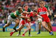 16 July 2023; Gareth McKinless of Derry is tackled by Stephen O'Brien and Tadhg Morley of Kerry during the GAA Football All-Ireland Senior Championship Semi-Final match between Derry and Kerry at Croke Park in Dublin. Photo by Brendan Moran/Sportsfile