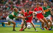 16 July 2023; Gareth McKinless of Derry is tackled by Stephen O'Brien and Tadhg Morley of Kerry during the GAA Football All-Ireland Senior Championship Semi-Final match between Derry and Kerry at Croke Park in Dublin. Photo by Brendan Moran/Sportsfile