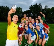 17 July 2023; Grassroots is where it all started for Republic of Ireland WNT players. The connection with their first clubs has never been lost on the WNT players as they continue preparations for the FIFA Women’s World Cup 2023 – their first ever major tournament. It is why 15 of the 26 players in Australia pulled on jerseys from their former clubs ahead of their training session in Meakin Park, Brisbane on Monday. Katie McCabe wearing the jersey of Kilnamanagh AFC takes a photograph with team-mates Ciara Grant wearing the jersey of Ballyraine FC; Claire O’Riordan wearing the jersey of Newcastle West Town FC; Amber Barrett wearing the jersey of Milford FC; Louise Quinn wearing the jersey of Blessington FC; Diane Caldwell wearing the jersey of Balbriggan FC; Niamh Fahey wearing the jersey of Salthill Devon FC; Heather Payne wearing the jersey of Ballinasloe Town AFC; Izzy Atkinson wearing the jersey of Rush Athletic FC; Jamie Finn wearing the jersey of Swords Manor FC; Denise O’Sullivan wearing the jersey of Wilton United; Áine O’Gorman wearing the jersey of Enniskerry FC; Megan Connolly wearing the jersey of College Corinthians AFC; Chloe Mustaki wearing the jersey of Park Celtic FC; and Abbie Larkin wearing the jersey of Cambridge FC. Photo by Stephen McCarthy/Sportsfile