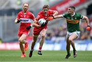 16 July 2023; Brendan Rogers of Derry in action against Paul Geaney of Kerry during the GAA Football All-Ireland Senior Championship Semi-Final match between Derry and Kerry at Croke Park in Dublin. Photo by David Fitzgerald/Sportsfile