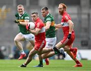 16 July 2023; Niall Toner of Derry, supported by team-mate Conor Glass, right, in action against Jason Foley, left, and Diarmuid O'Connor of Kerry during the GAA Football All-Ireland Senior Championship Semi-Final match between Derry and Kerry at Croke Park in Dublin. Photo by Piaras Ó Mídheach/Sportsfile