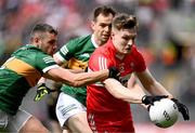 16 July 2023; Ethan Doherty of Derry in action against Graham O'Sullivan, left, and Jack Barry of Kerry during the GAA Football All-Ireland Senior Championship Semi-Final match between Derry and Kerry at Croke Park in Dublin. Photo by Piaras Ó Mídheach/Sportsfile