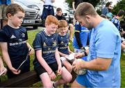 17 July 2023; John McKee signs autographs for supporters after a Leinster rugby squad training and gym session at Wicklow RFC in Wicklow. Photo by Brendan Moran/Sportsfile