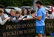 17 July 2023; Will Connors signs autographs for supporters after a Leinster rugby squad training and gym session at Wicklow RFC in Wicklow. Photo by Brendan Moran/Sportsfile