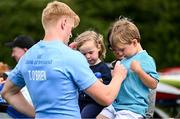 17 July 2023; Tommy O'Brien signs autographs for supporters after a Leinster rugby squad training and gym session at Wicklow RFC in Wicklow. Photo by Brendan Moran/Sportsfile