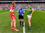 16 July 2023; Referee Joe McQuillan with team captains Conor Glass of Derry and David Clifford of Kerry before the GAA Football All-Ireland Senior Championship Semi-Final match between Derry and Kerry at Croke Park in Dublin. Photo by Piaras Ó Mídheach/Sportsfile