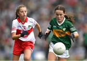 16 July 2023; Ava Gallagher, Moylough N.S., Tubbercurry, Sligo, representing Kerry, in action against Lauren Keena, Cornafulla N.S., Athlone, Roscommon, representing Derry, during the INTO Cumann na mBunscol GAA Respect Exhibition Go Games at the GAA Football All-Ireland Senior Championship Semi-Final match between Derry and Kerry at Croke Park in Dublin. Photo by Brendan Moran/Sportsfile