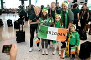 19 July 2023; Republic of Ireland manager Vera Pauw and Diane Caldwell pose with the Prout family, from left, Isla, Maeve, dad Gerry and Oscar, who are living in Sydney, but originally from Balbriggan in Dublin, at Sydney Airport, Australia, upon the team's arrival from their base in Brisbane, for their opening FIFA Women's World Cup 2023 group match against co-host Australia, on Thursday. Photo by Stephen McCarthy/Sportsfile