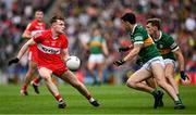 16 July 2023; Ethan Doherty of Derry in action against Tony Brosnan and Gavin White of Kerry during the GAA Football All-Ireland Senior Championship Semi-Final match between Derry and Kerry at Croke Park in Dublin. Photo by Brendan Moran/Sportsfile