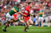 16 July 2023; Ethan Doherty of Derry is tackled by Graham O'Sullivan of Kerry during the GAA Football All-Ireland Senior Championship Semi-Final match between Derry and Kerry at Croke Park in Dublin. Photo by Brendan Moran/Sportsfile