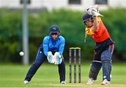 19 July 2023; Lara Maritz of Scorchers plays a shot watched by Typhoons wicketkeeper Mary Waldron during the Evoke Super Series 2023 match between Typhoons and Scorchers at Pembroke Cricket Club in Dublin. Photo by Sam Barnes/Sportsfile