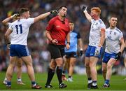 15 July 2023; Referee Sean Hurson with Michael Bannigan, left, and Ryan O'Toole of Monaghan during the GAA Football All-Ireland Senior Championship semi-final match between Dublin and Monaghan at Croke Park in Dublin. Photo by Brendan Moran/Sportsfile