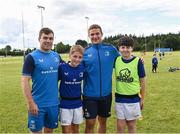 19 July 2023; Leinster players Luke McGrath, left, and Scott Penny with participants during a Bank of Ireland Leinster Rugby Summer Camp at Portlaoise RFC in Laois. Photo by Piaras Ó Mídheach/Sportsfile