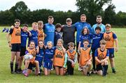 19 July 2023; Leinster players Luke McGrath, left, and coach Eoin Farrell with participants during a Bank of Ireland Leinster Rugby Summer Camp at Portlaoise RFC in Laois. Photo by Piaras Ó Mídheach/Sportsfile