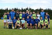 19 July 2023; Leinster players Scott Penny, left, and Luke McGrath with participants during a Bank of Ireland Leinster Rugby Summer Camp at Portlaoise RFC in Laois. Photo by Piaras Ó Mídheach/Sportsfile