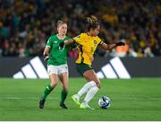 20 July 2023; Mary Fowler of Australia is tackled by Sinead Farrelly of Republic of Ireland during the FIFA Women's World Cup 2023 Group B match between Australia and Republic of Ireland at Stadium Australia in Sydney, Australia. Photo by Mick O'Shea/Sportsfile