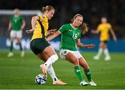20 July 2023; Clare Hunt of Australia in action against Kyra Carusa of Republic of Ireland during the FIFA Women's World Cup 2023 Group B match between Australia and Republic of Ireland at Stadium Australia in Sydney, Australia. Photo by Stephen McCarthy/Sportsfile