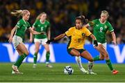 20 July 2023; Mary Fowler of Australia in action against Denise O'Sullivan, left, and Ruesha Littlejohn of Republic of Ireland during the FIFA Women's World Cup 2023 Group B match between Australia and Republic of Ireland at Stadium Australia in Sydney, Australia. Photo by Stephen McCarthy/Sportsfile