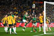 20 July 2023; Australia goalkeeper Mackenzie Arnold gathers possession ahead of Louise Quinn, left, and Kyra Carusa and Ruesha Littlejohn of Republic of Ireland during the FIFA Women's World Cup 2023 Group B match between Australia and Republic of Ireland at Stadium Australia in Sydney, Australia. Photo by Stephen McCarthy/Sportsfile