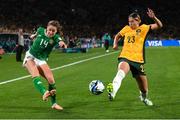 20 July 2023; Heather Payne of Republic of Ireland in action against Kyra Cooney-Cross of Australia during the FIFA Women's World Cup 2023 Group B match between Australia and Republic of Ireland at Stadium Australia in Sydney, Australia. Photo by Stephen McCarthy/Sportsfile