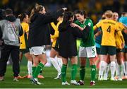 20 July 2023; Niamh Fahey of Republic of Ireland with teammates Marissa Sheva after the FIFA Women's World Cup 2023 Group B match between Australia and Republic of Ireland at Stadium Australia in Sydney, Australia. Photo by Stephen McCarthy/Sportsfile