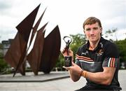 20 July 2023; PwC GAA/GPA Player of the Month for June in hurling, Conor Whelan of Galway, with his award in Eyre Square in Galway. Photo by Harry Murphy/Sportsfile