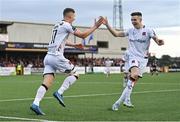 20 July 2023; John Martin of Dundalk celebrates with teammate Darragh Leahy after scoring their side's second goal during the UEFA Europa Conference League First Qualifying Round 2nd Leg match between Dundalk and FC Bruno's Magpies at Oriel Park in Dundalk, Louth. Photo by Ben McShane/Sportsfile
