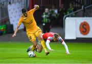 20 July 2023; Samir Hadji of F91 Diddeleng is tackled by Jamie Lennon of St Patrick's Athletic during the UEFA Europa Conference League First Qualifying Round 2nd Leg match between St Patrick's Athletic and F91 Diddeleng at Richmond Park in Dublin.