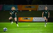 21 July 2023; Amber Barrett, left, and Claire O'Riordan do a dance as a forfeit following a training drill during a Republic of Ireland training session at Meakin Park in Brisbane, Australia, ahead of their second Group B match of the FIFA Women's World Cup 2023, against Canada. Photo by Stephen McCarthy/Sportsfile