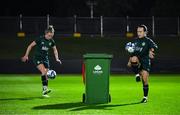 21 July 2023; Ciara Grant and Claire O'Riordan, left, during a training drill with a wheelie bin at a Republic of Ireland training session at Meakin Park in Brisbane, Australia, ahead of their second Group B match of the FIFA Women's World Cup 2023, against Canada. Photo by Stephen McCarthy/Sportsfile