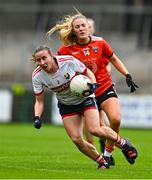 15 July 2023; Melissa Duggan of Cork and Kelly Mallon of Armagh during the TG4 Ladies Football All-Ireland Senior Championship quarter-final match between Armagh and Cork at BOX-IT Athletic Grounds in Armagh. Photo by Ben McShane/Sportsfile