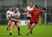 15 July 2023; Laura O'Mahony of Cork and Niamh Reel of Armagh during the TG4 Ladies Football All-Ireland Senior Championship quarter-final match between Armagh and Cork at BOX-IT Athletic Grounds in Armagh. Photo by Ben McShane/Sportsfile