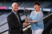 21 July 2023; Former Glen Rovers and Cork camogie player Sandie Fitzgibbon receives her Lifetime Achievement Award from Chief Operating Officer of the GPA Ciaran Barr during the GPA Camogie and Hurling Legends lunch at Croke Park in Dublin. Photo by David Fitzgerald/Sportsfile