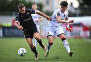 20 July 2023; Jamie Coombes of FC Bruno's Magpies and Ryan O'Kane of Dundalk during the UEFA Europa Conference League First Qualifying Round 2nd Leg match between Dundalk and FC Bruno's Magpies at Oriel Park in Dundalk, Louth. Photo by Ben McShane/Sportsfile