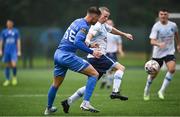 21 July 2023; Jack Kelly of Kilbarrack United in action against Matty Makinson of Finn Harps during the Sports Direct Men’s FAI Cup First Round match between Kilbarrack United and Finn Harps at White Heart Lane in Kilbarrack, Dublin. Photo by David Fitzgerald/Sportsfile