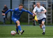 21 July 2023; Jack Kelly of Kilbarrack United in action against Stephen Doherty of Finn Harps during the Sports Direct Men’s FAI Cup First Round match between Kilbarrack United and Finn Harps at White Heart Lane in Kilbarrack, Dublin. Photo by David Fitzgerald/Sportsfile