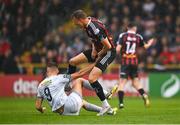 21 July 2023; Kacper Radkowski of Bohemians tussles with Sean Boyd of Shelbourne during the Sports Direct Men’s FAI Cup First Round match between Bohemians and Shelbourne at Dalymount Park in Dublin. Photo by Seb Daly/Sportsfile