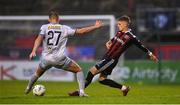 21 July 2023; Paddy Kirk of Bohemians in action against Evan Caffrey of Shelbourne during the Sports Direct Men’s FAI Cup First Round match between Bohemians and Shelbourne at Dalymount Park in Dublin. Photo by Seb Daly/Sportsfile