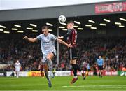 21 July 2023; Paddy Kirk of Bohemians in action against Evan Caffrey of Shelbourne during the Sports Direct Men’s FAI Cup First Round match between Bohemians and Shelbourne at Dalymount Park in Dublin. Photo by Seb Daly/Sportsfile