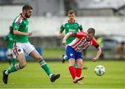 22 July 2023; William Armshaw of Treaty United in action against Conor Drinan of Cork City during the Sports Direct Men’s FAI Cup First Round match between Treaty United and Cork City at Markets Field in Limerick. Photo by Michael P Ryan/Sportsfile