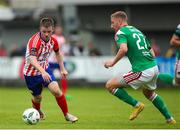 22 July 2023; William Armshaw of Treaty United in action against Kevin Custovic of Cork City during the Sports Direct Men’s FAI Cup First Round match between Treaty United and Cork City at Markets Field in Limerick. Photo by Michael P Ryan/Sportsfile