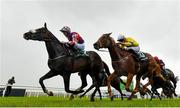22 July 2023; Strike Red, left, with Billy Garrity up, on their way to winning the Paddy Power Scurry Handicap, from second place Aussie Girl, right, with Jamie Powell up, during day one of the Juddmonte Irish Oaks Weekend at The Curragh Racecourse in Kildare. Photo by Seb Daly/Sportsfile
