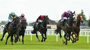 22 July 2023; Strike Red, second from right, with Billy Garritty up, on their way to winning the Paddy Power Scurry Handicap during day one of the Juddmonte Irish Oaks Weekend at The Curragh Racecourse in Kildare. Photo by Seb Daly/Sportsfile