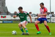 22 July 2023; Cian Bargary of Cork Cit in action against Marc Ludden of Treaty United during the Sports Direct Men’s FAI Cup First Round match between Treaty United and Cork City at Markets Field in Limerick. Photo by Michael P Ryan/Sportsfile