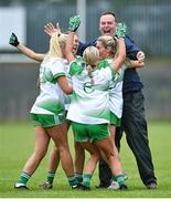 22 July 2023; Limerick manager Graham Shine celebrates with players after the TG4 LGFA All-Ireland Junior Championship semi-final match between Limerick and Fermanagh at Glennon Brothers Pearse Park in Longford. Photo by David Fitzgerald/Sportsfile