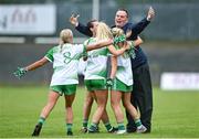 22 July 2023; Limerick manager Graham Shine celebrates with players after the TG4 LGFA All-Ireland Junior Championship semi-final match between Limerick and Fermanagh at Glennon Brothers Pearse Park in Longford. Photo by David Fitzgerald/Sportsfile