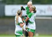 22 July 2023; Roisin Ambrose, right, and Meadhbh MacNamara of Limerick celebrate with Eánna McKenna, age 2, after the TG4 LGFA All-Ireland Junior Championship semi-final match between Limerick and Fermanagh at Glennon Brothers Pearse Park in Longford. Photo by David Fitzgerald/Sportsfile