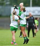 22 July 2023; Roisin Ambrose, right, and Meadhbh MacNamara of Limerick celebrate with Eánna McKenna, age 2, after the TG4 LGFA All-Ireland Junior Championship semi-final match between Limerick and Fermanagh at Glennon Brothers Pearse Park in Longford. Photo by David Fitzgerald/Sportsfile