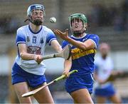 22 July 2023; Casey Hennessy of Tipperary in action against Mairéad O'Brien of Waterford during the All-Ireland Camogie Championship semi-final match between Tipperary and Waterford at UPMC Nowlan Park in Kilkenny. Photo by Piaras Ó Mídheach/Sportsfile